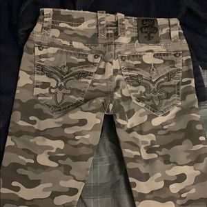 camouflage Rock Revival pants.